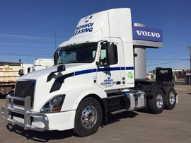 TANDEM AXLE DAY CAB TRACTOR