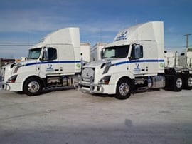 TANDEM AXLE SLEEPER CAB TRACTOR