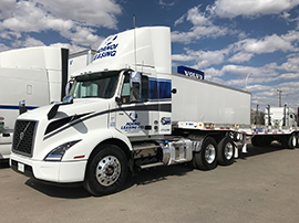 TANDEM AXLE DAY CAB TRACTOR